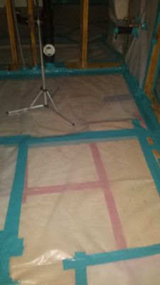 cover the flooring with plastic - mold removal